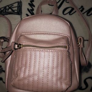 pink metallic mini backpack purse
